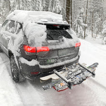 Load image into Gallery viewer, The Recovery Board bracket attaches directly to the Base Deck in less than a minute and works with most recovery board types, such as Actiontrax and Maxtraxs, shown with Ski Kit